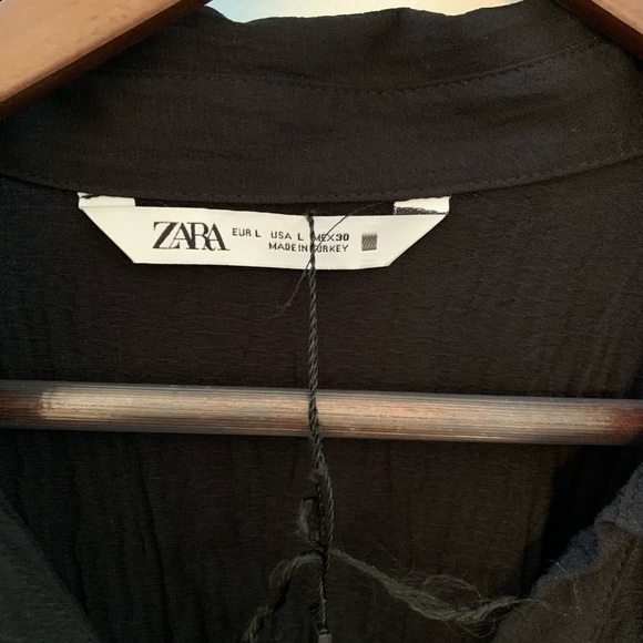 Brand new Zara shirt dress never worn. Size large and black. - Picture 2 of 3